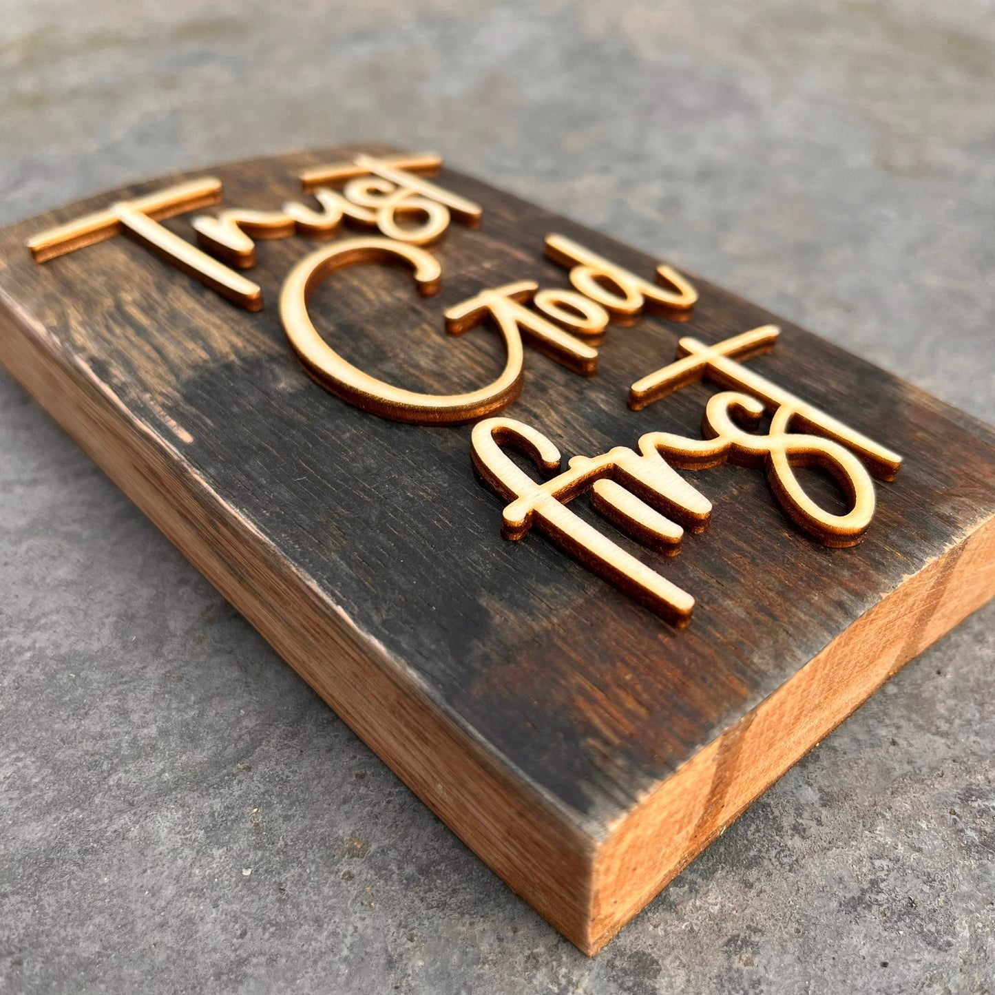 'Trust God first' rustic wooden plaque