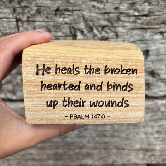 'He heals the broken hearted' laser engraved live edge plaque
