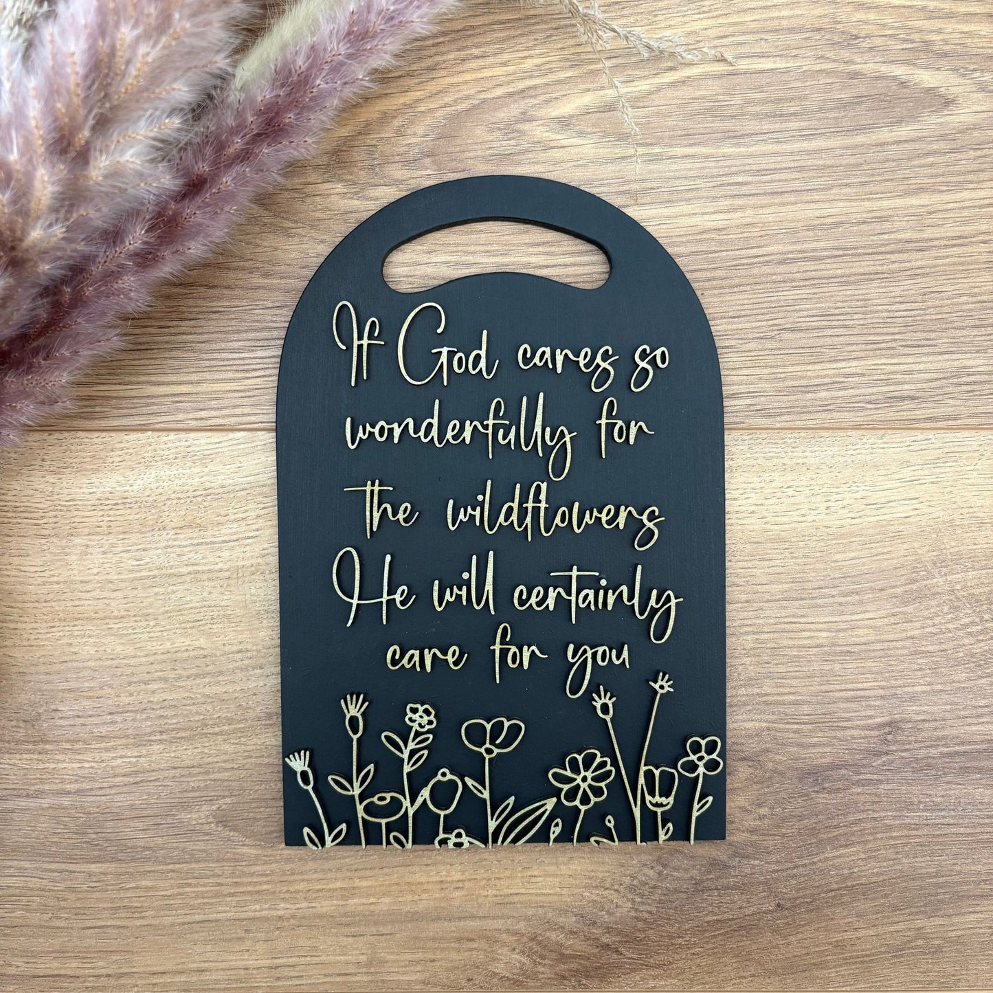 'He will certainly care for you' black/gold decorative plaque