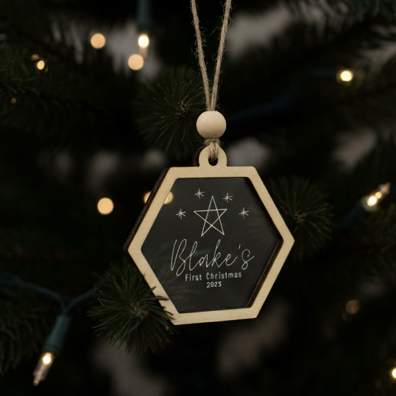 β 'Baby's first Christmas' - Personalised laser engraved wood/acrylic bauble
