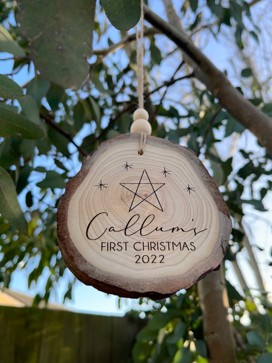❆ ‘Baby's first Christmas' personalised log slice Christmas bauble