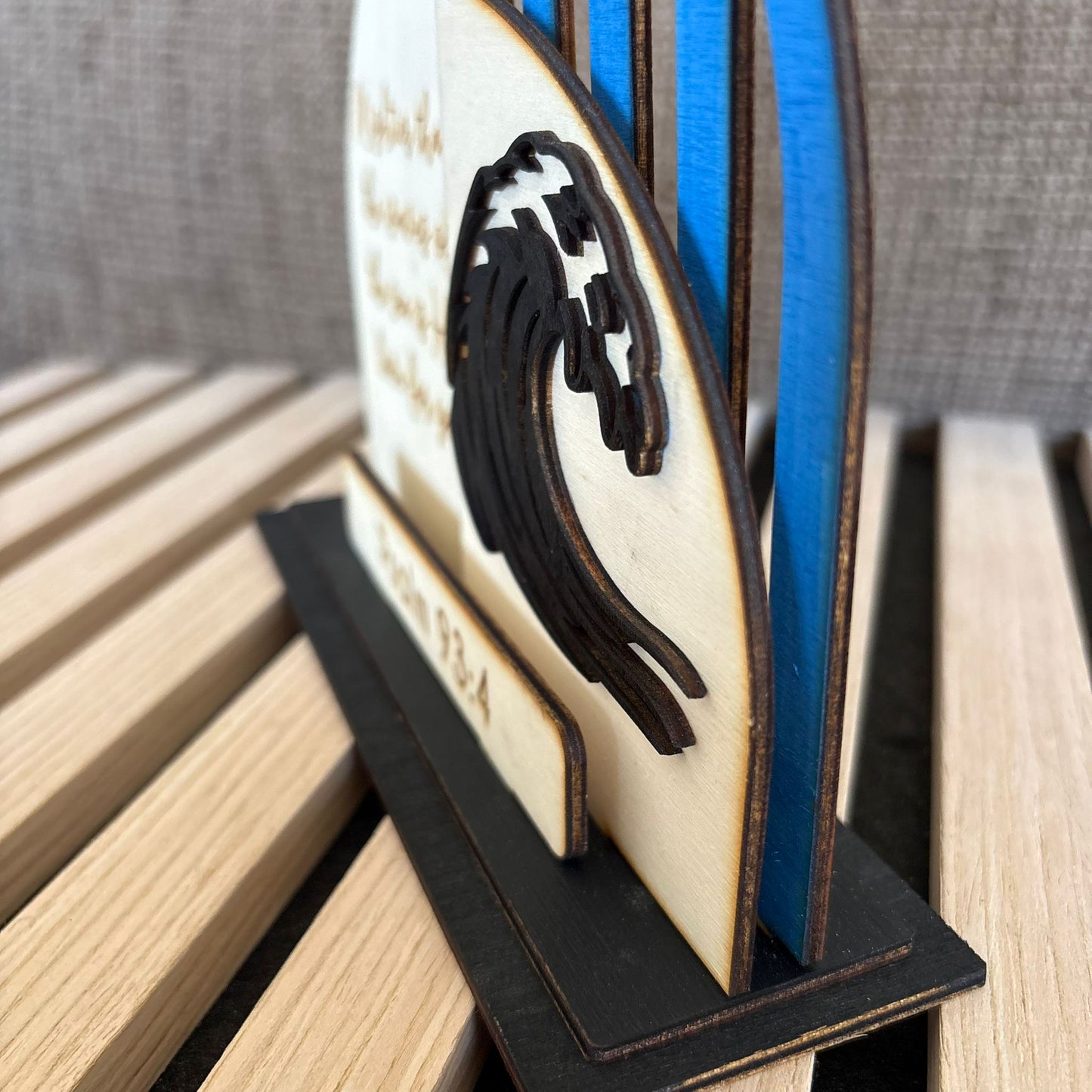 'Mightier than the waves of the sea' layered lasercut display