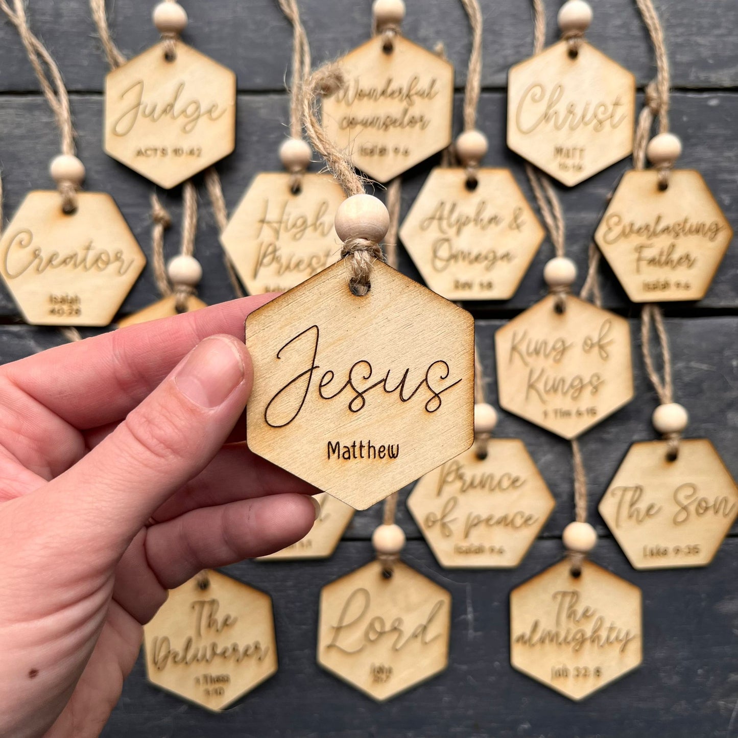 ❆ ‘Names of Christ advent baubles' - set of 25 wooden baubles
