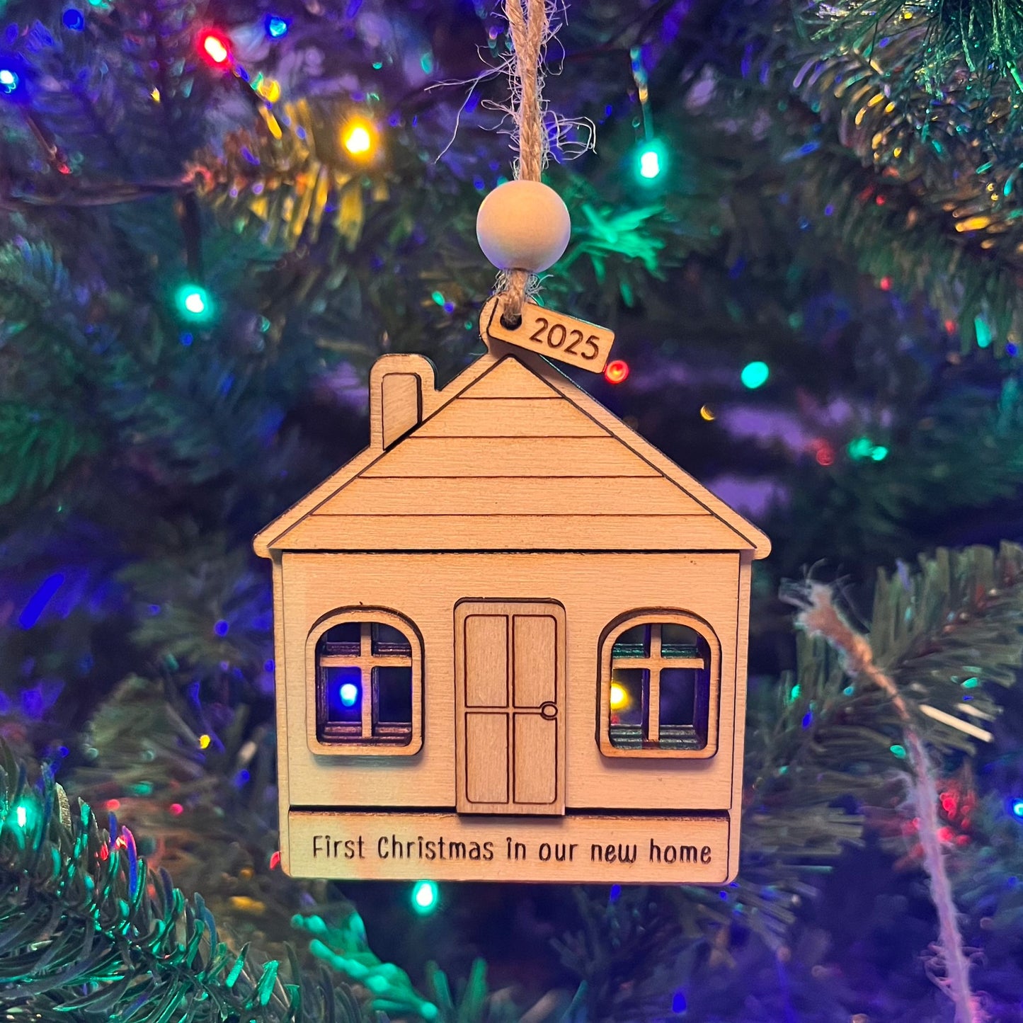 ❆ 'First Christmas in our new home' wooden Christmas bauble