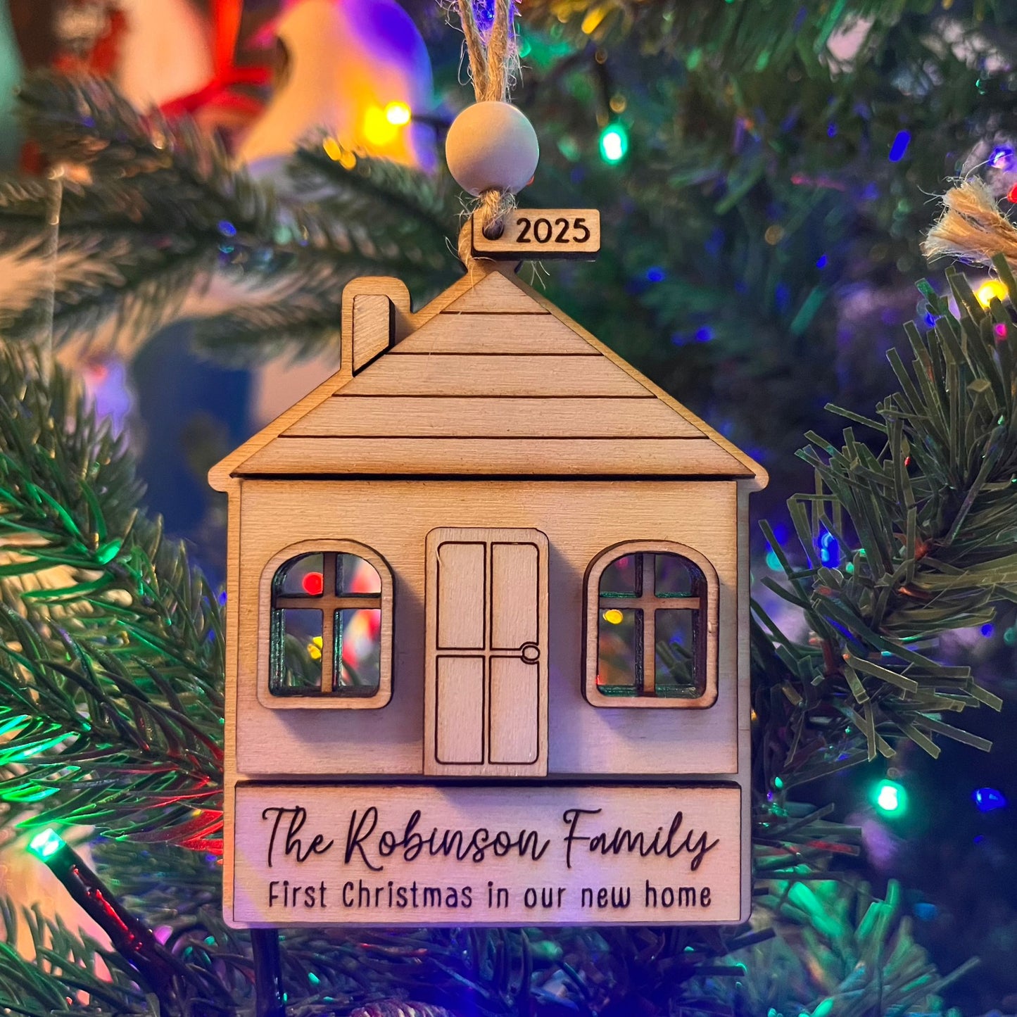 ❆ 'First Christmas in our new home' wooden Christmas bauble