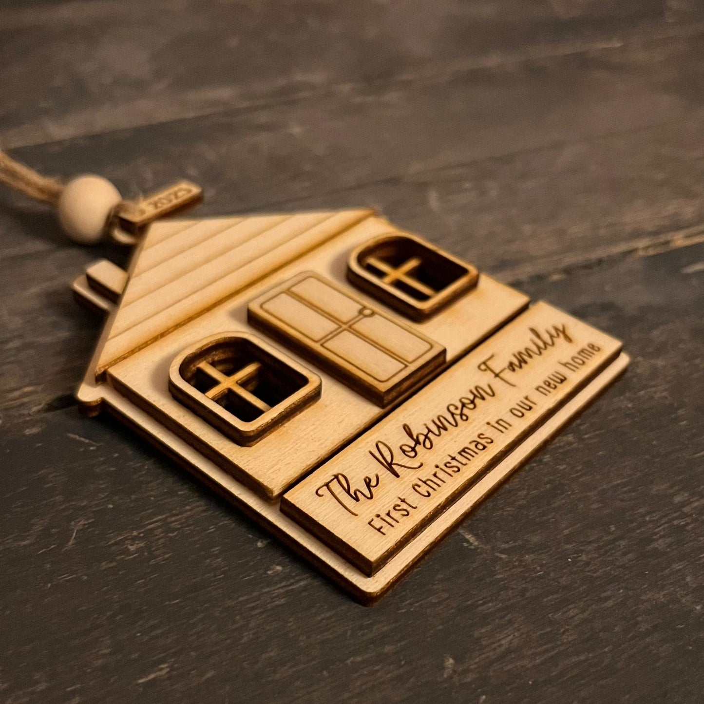 ❆ 'First Christmas in our new home' wooden Christmas bauble