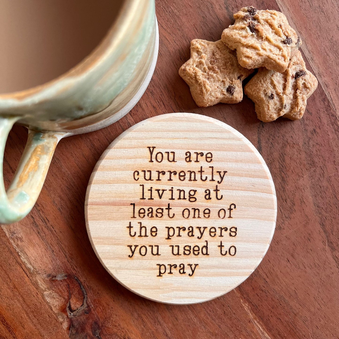 ‘Living your prayers' wooden coaster