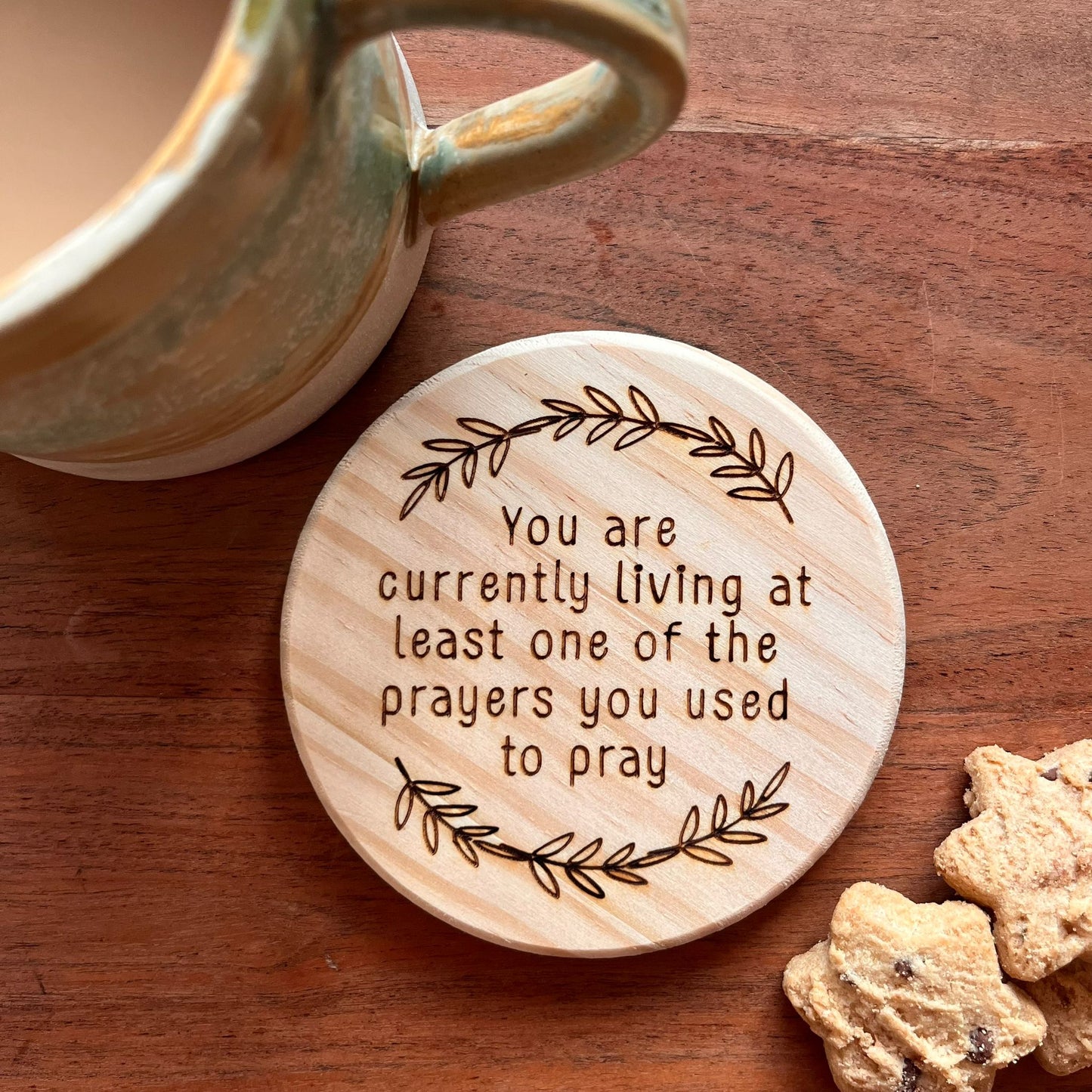 ‘Living your prayers' wooden coaster