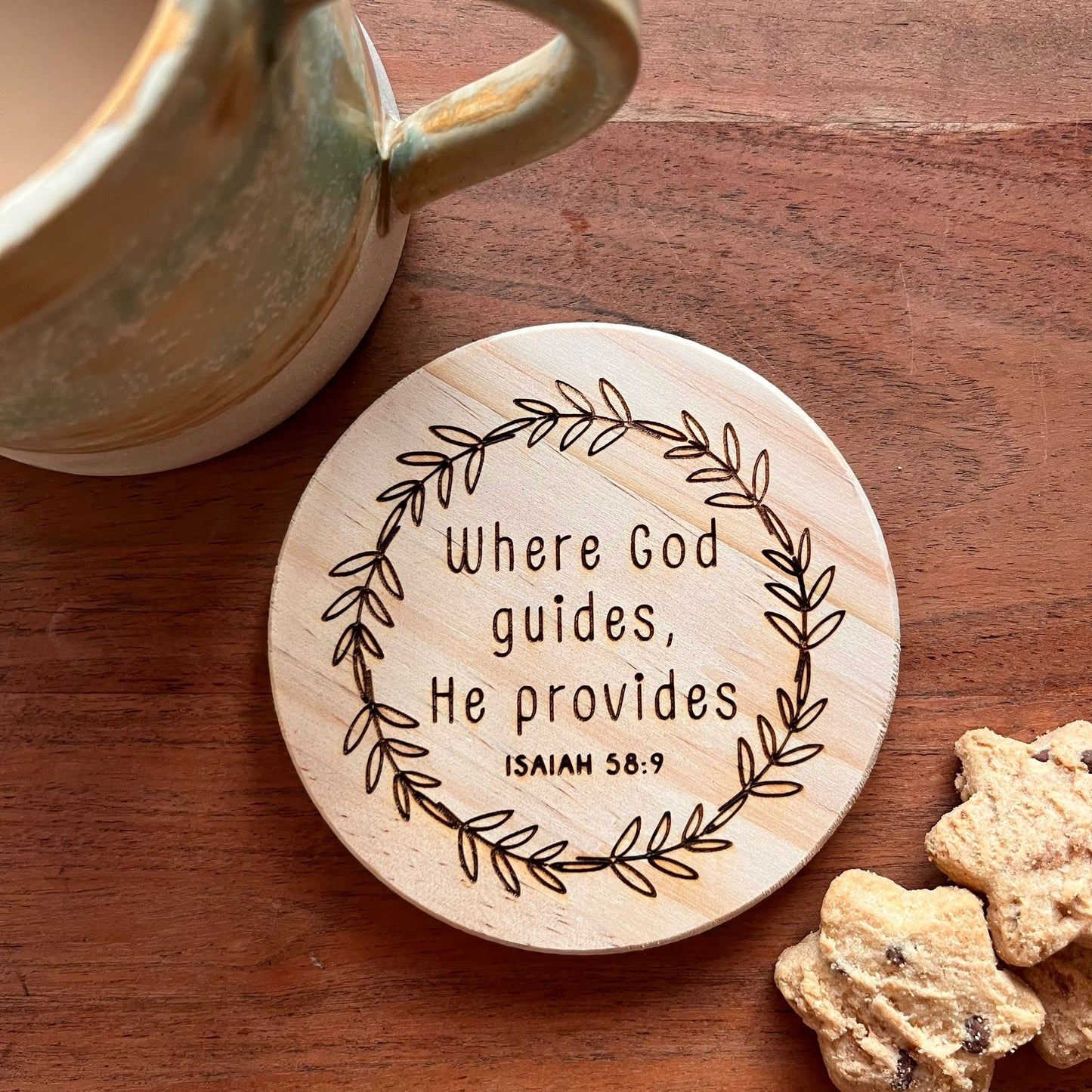 'Where God guides, He provides' wooden coaster