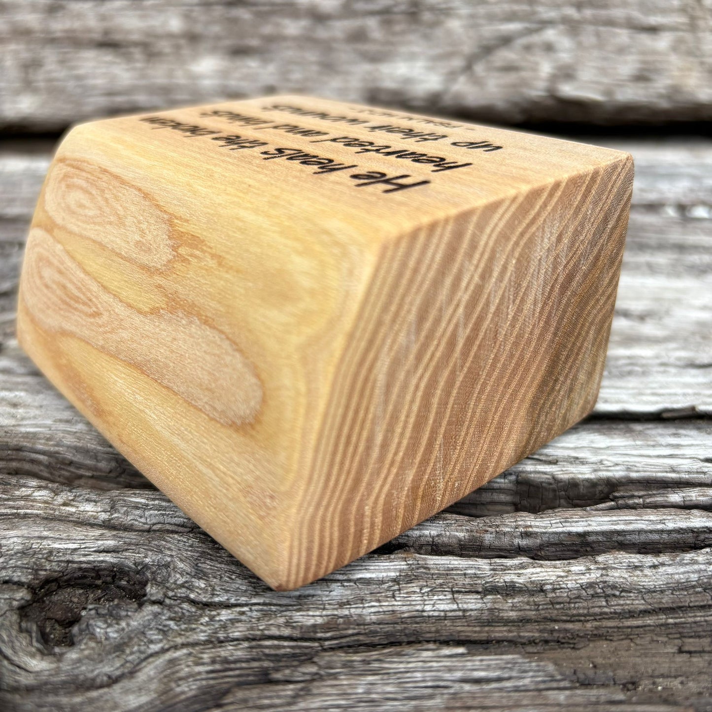 'He heals the broken hearted' laser engraved live edge plaque