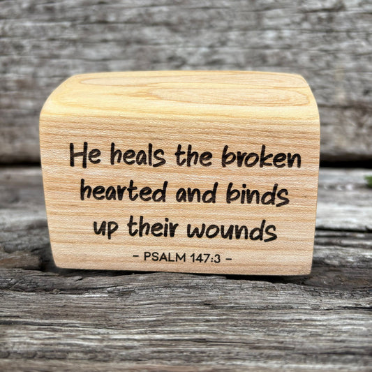 'He heals the broken hearted' laser engraved live edge plaque