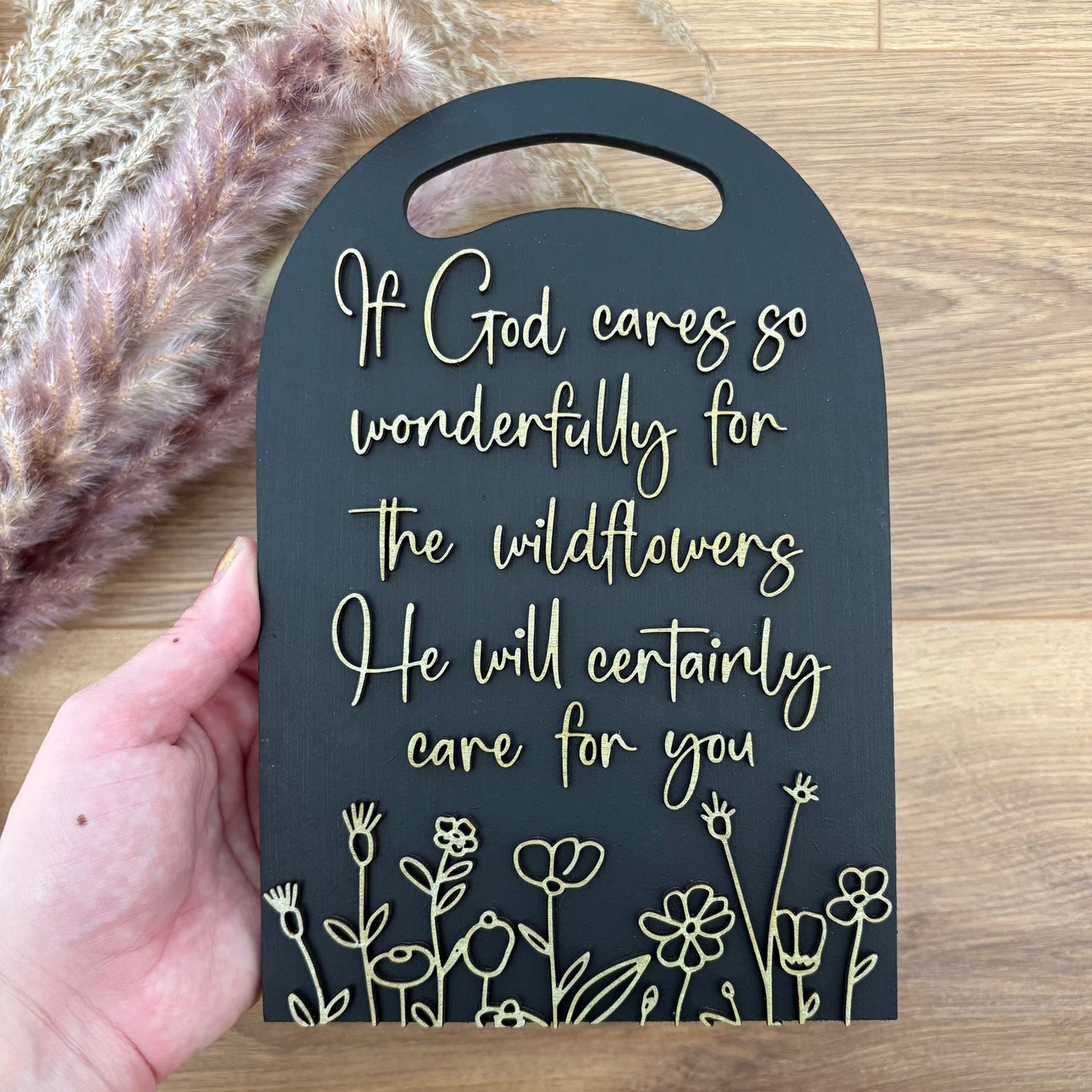 'He will certainly care for you' black/gold decorative plaque