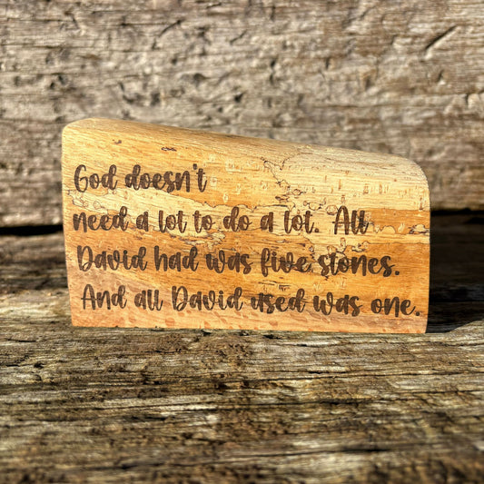 'God doesn't need a lot' solid wood plaque