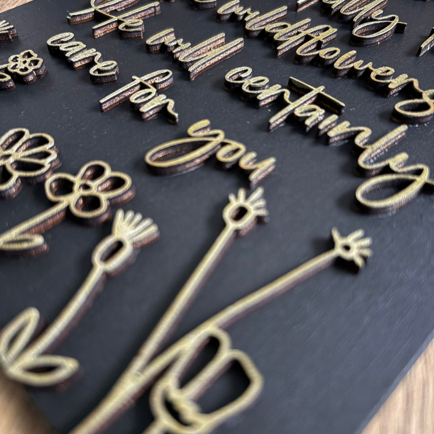 'He will certainly care for you' black/gold decorative plaque