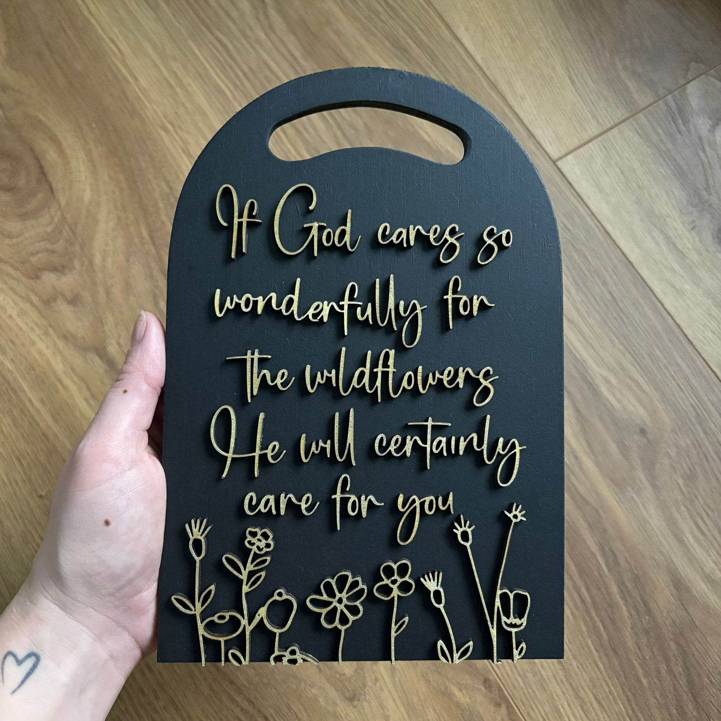'He will certainly care for you' black/gold decorative plaque