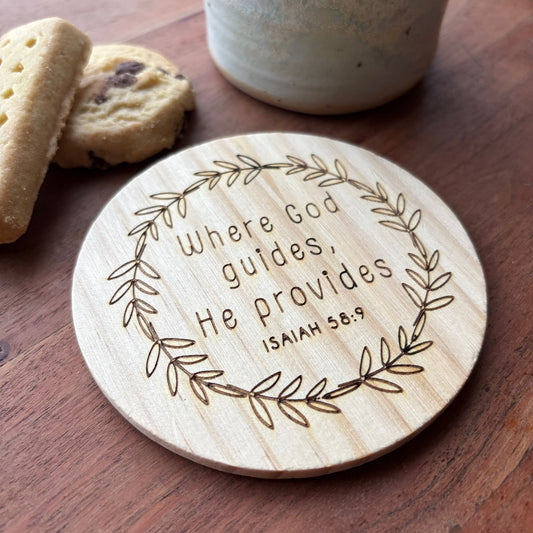 'Where God guides, He provides' wooden coaster