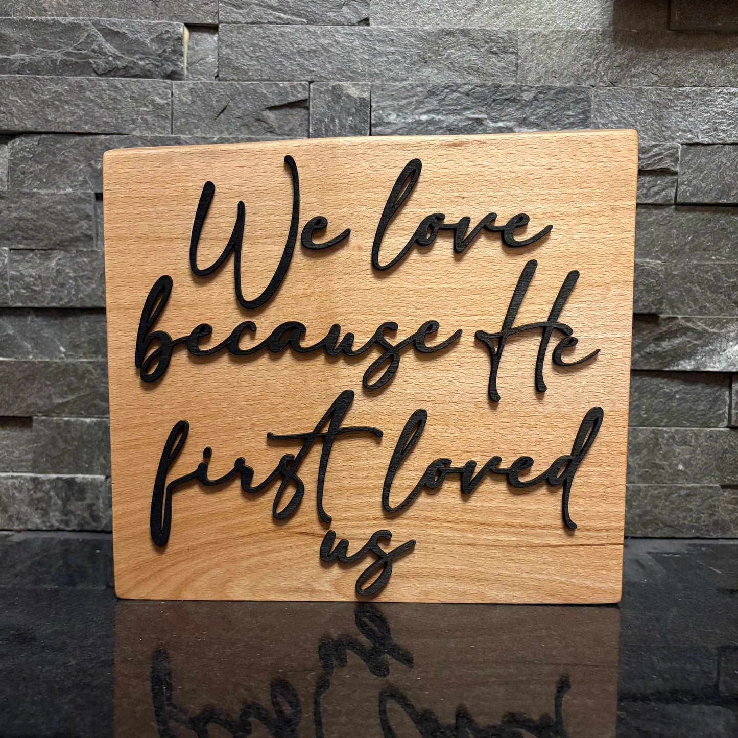 'We love because He first loved us' decorative beech plaque