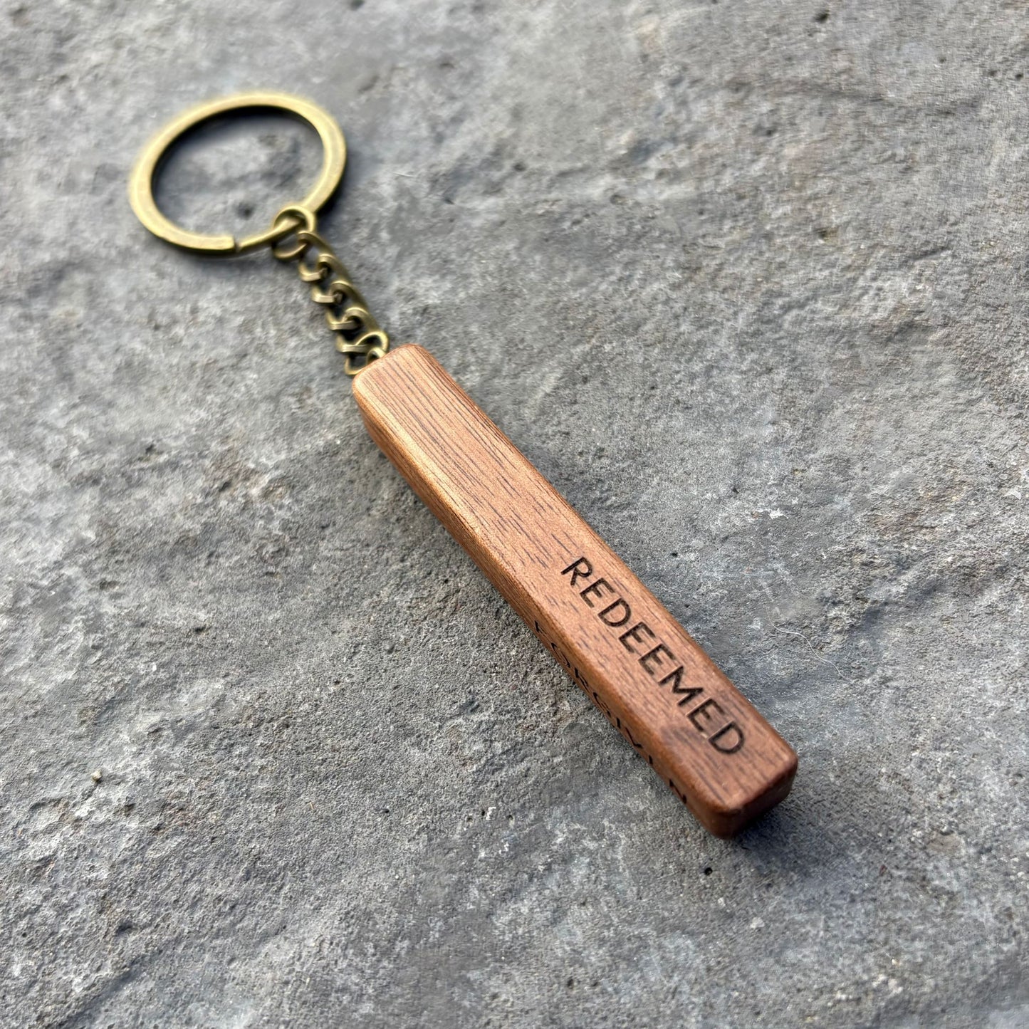 'Rescued, redeemed, forgiven, free' walnut bar keyring