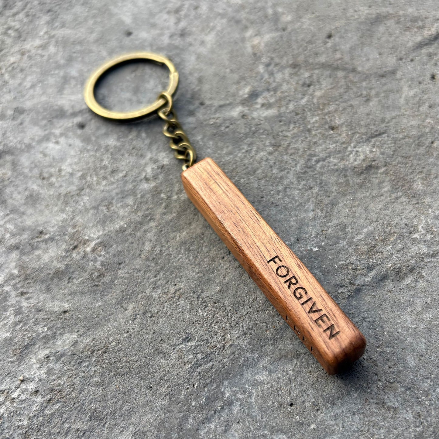 'Rescued, redeemed, forgiven, free' walnut bar keyring