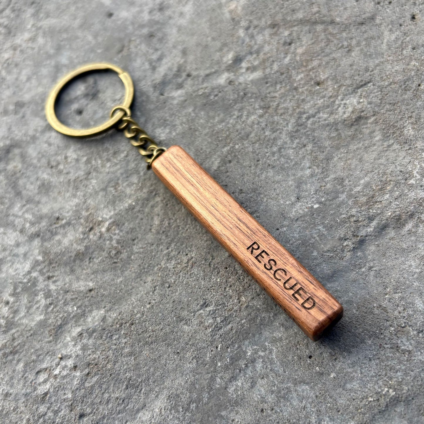 'Rescued, redeemed, forgiven, free' walnut bar keyring