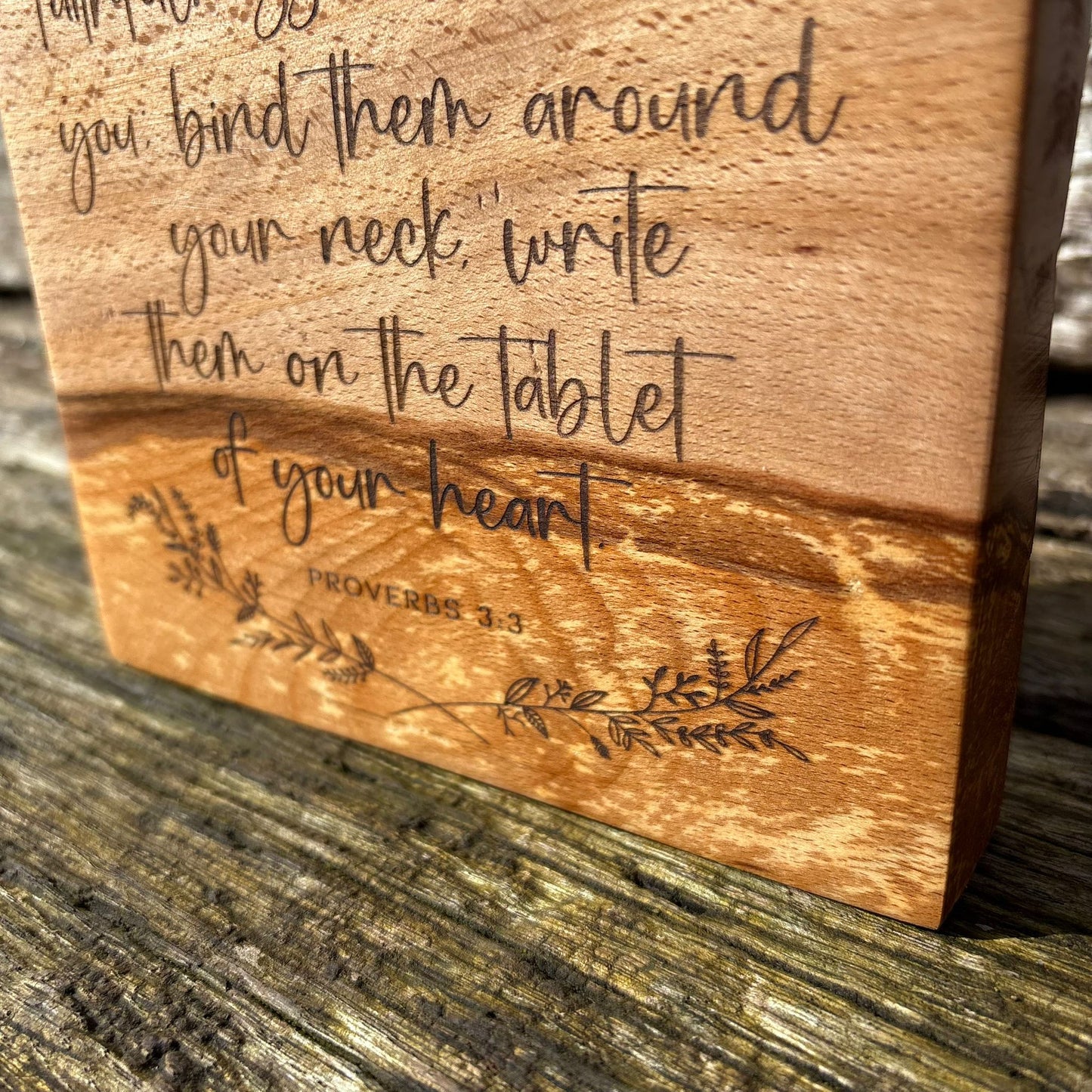 'Let love and faithfulness never leave you' laser engraved live edge beech plaque