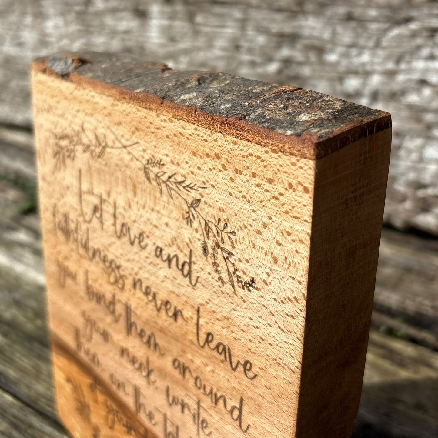 'Let love and faithfulness never leave you' laser engraved live edge beech plaque