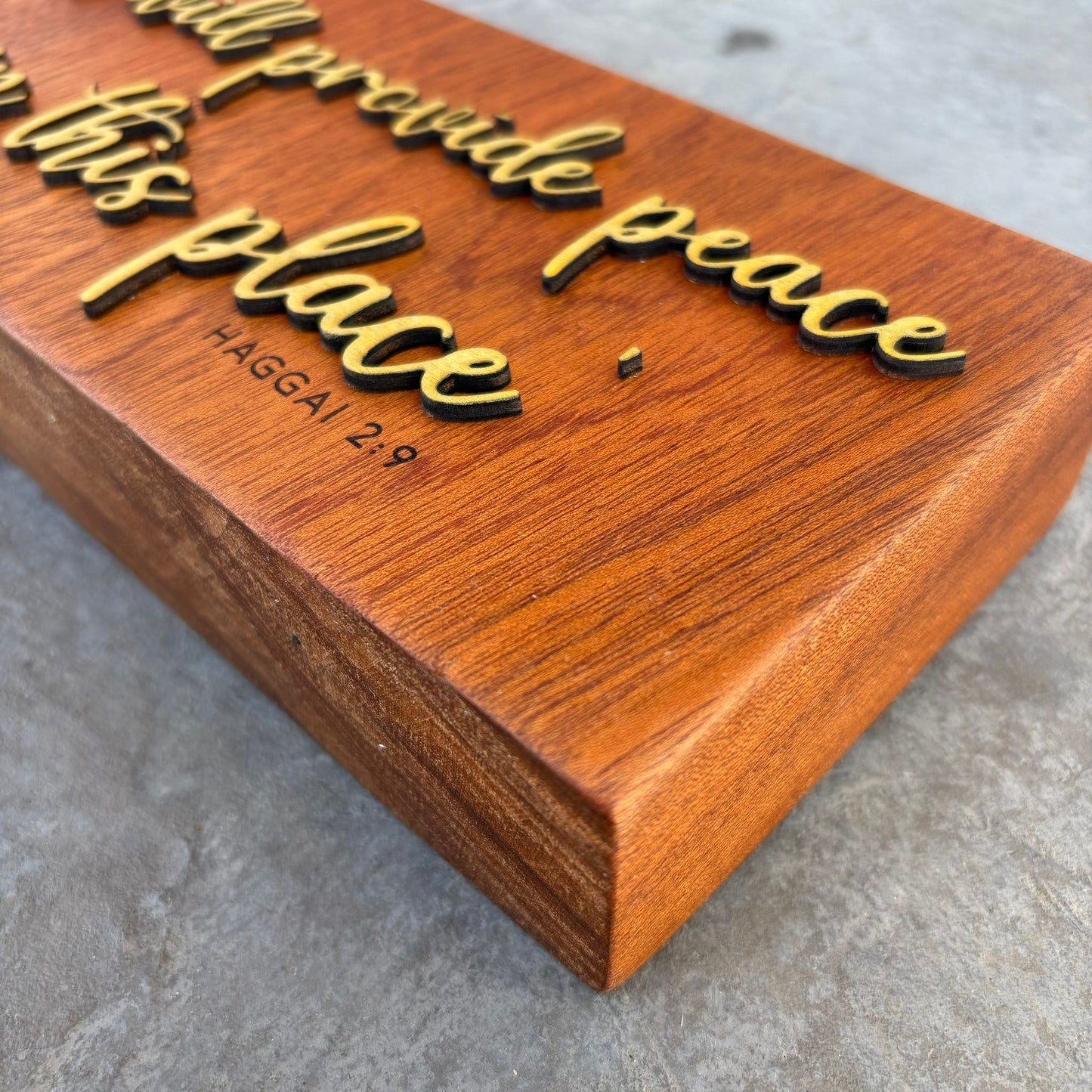 'I will provide peace in this place' - decorative mahogany plaque