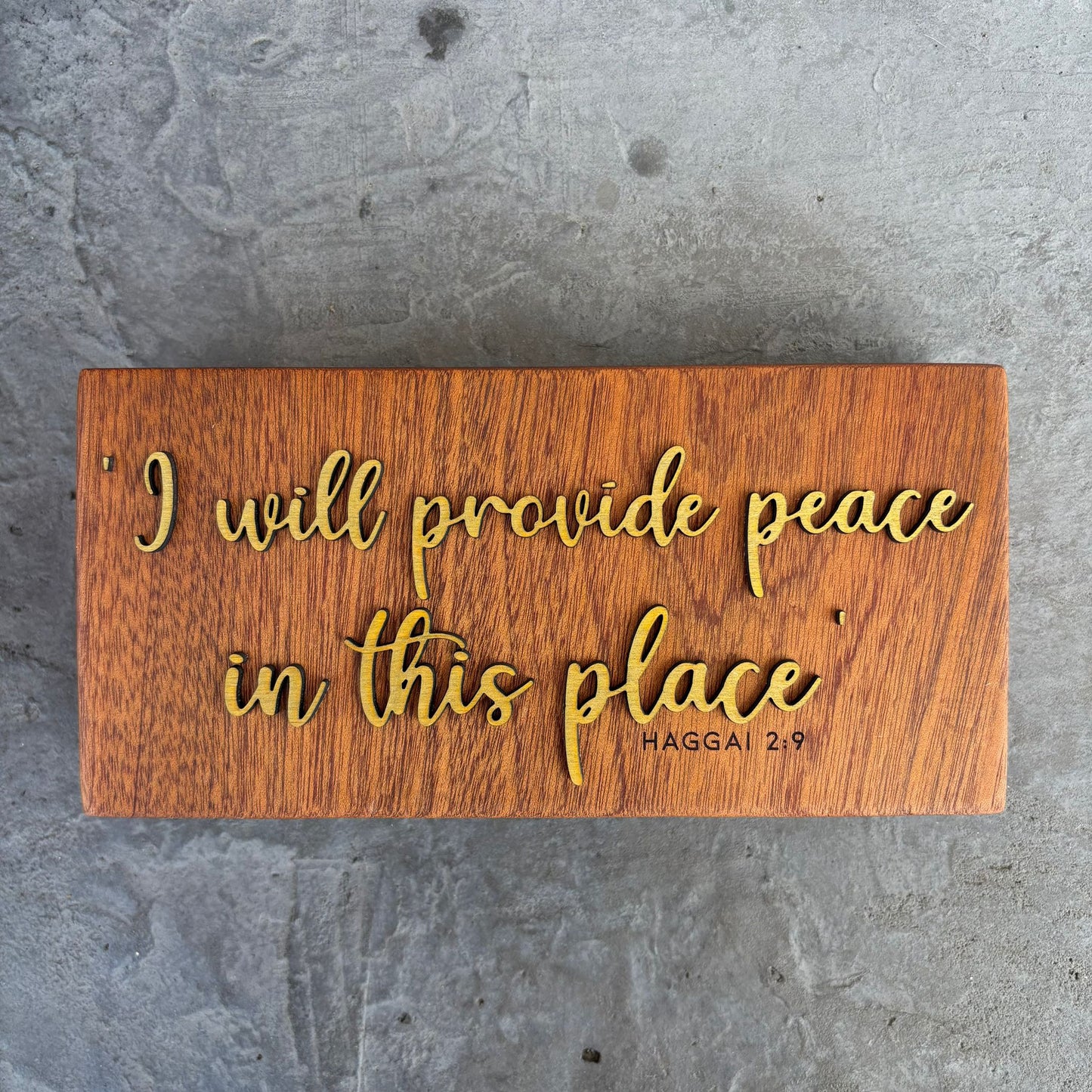 'I will provide peace in this place' - decorative mahogany plaque