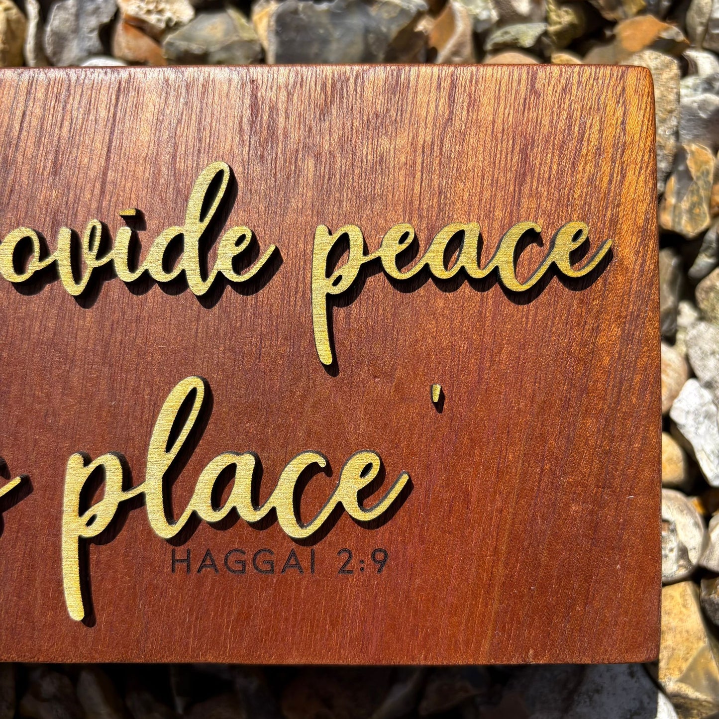 'I will provide peace in this place' - decorative mahogany plaque