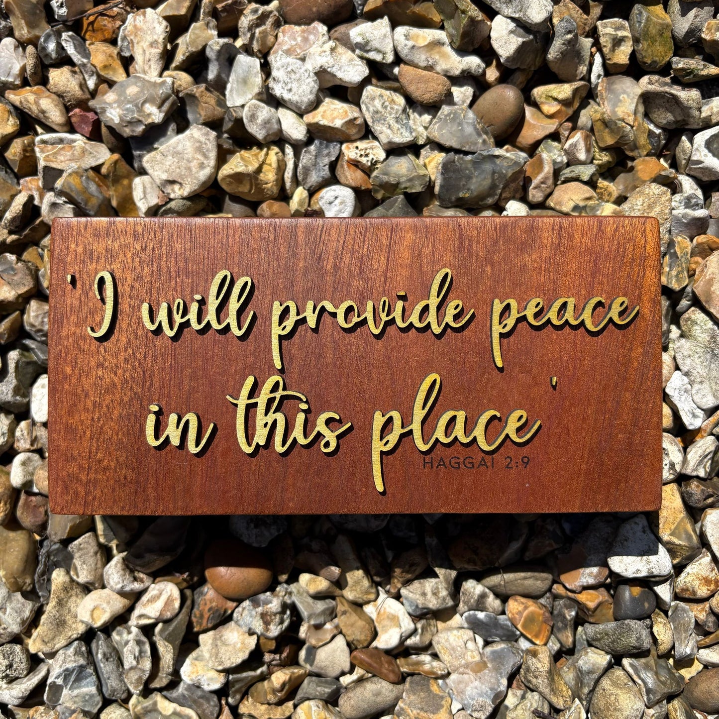 'I will provide peace in this place' - decorative mahogany plaque