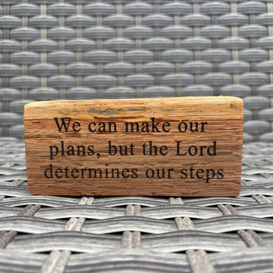 'We can make our plans, but the Lord determines our steps' - rustic decorative plaque
