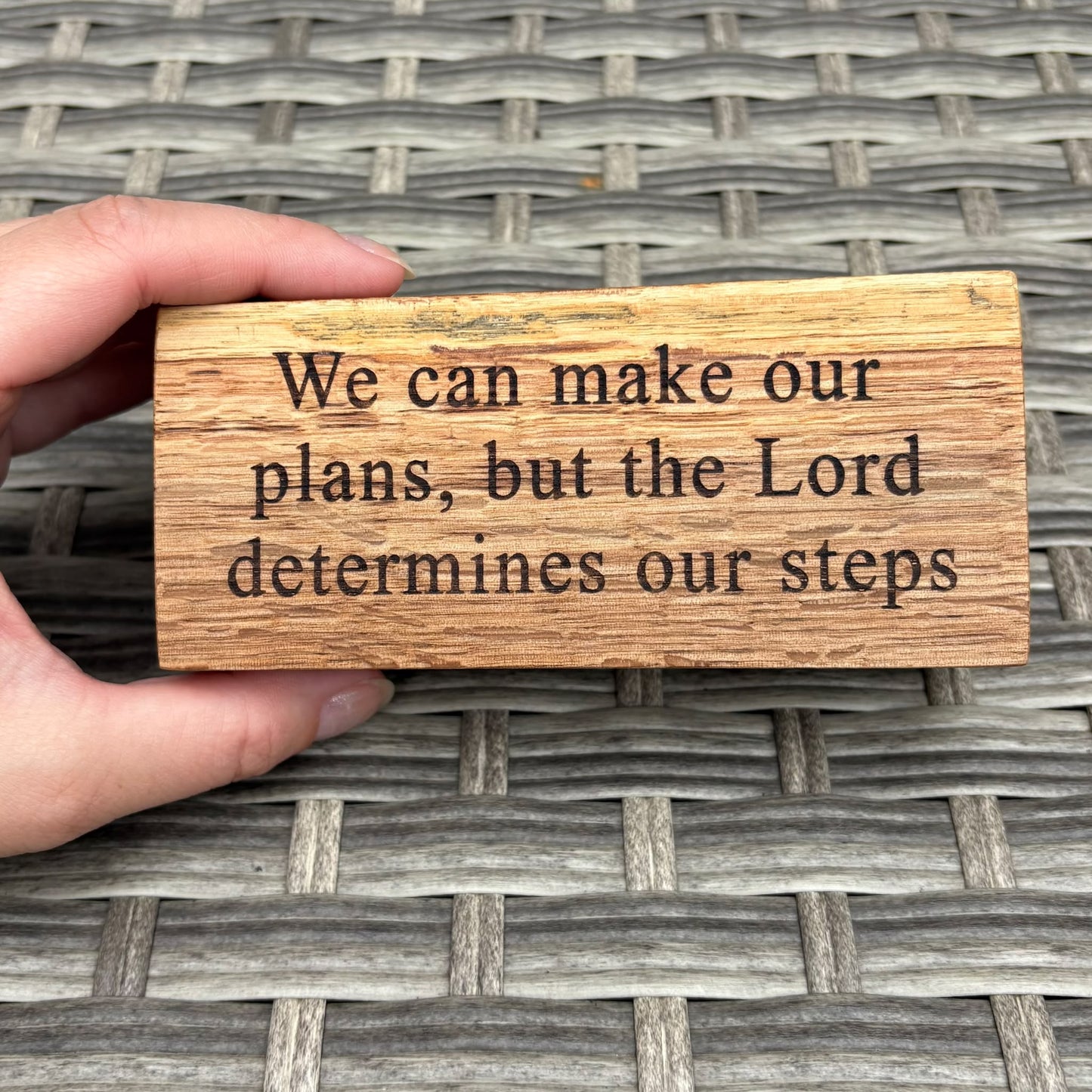 'We can make our plans, but the Lord determines our steps' - rustic decorative plaque