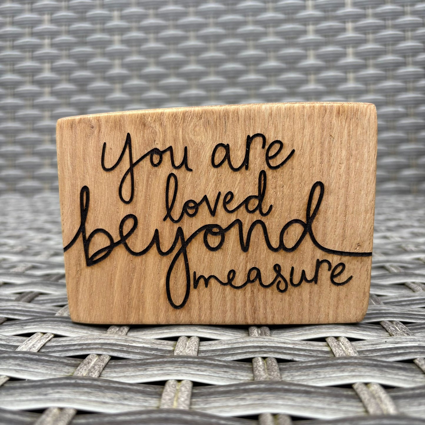 'You are loved beyond measure' decorative plaque