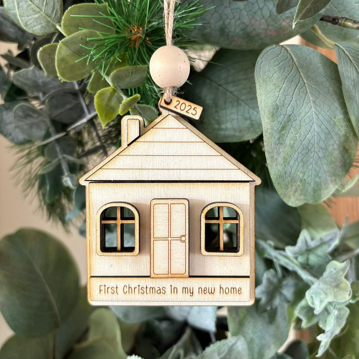 ❆ 'First Christmas in our new home' wooden Christmas bauble