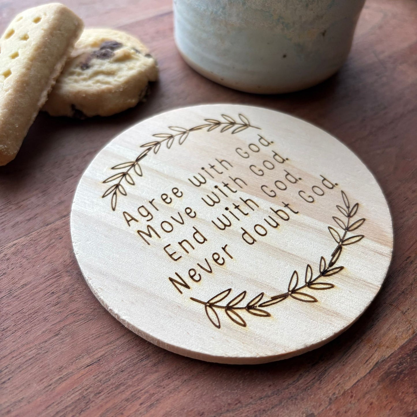 ‘Never doubt God' wooden coaster