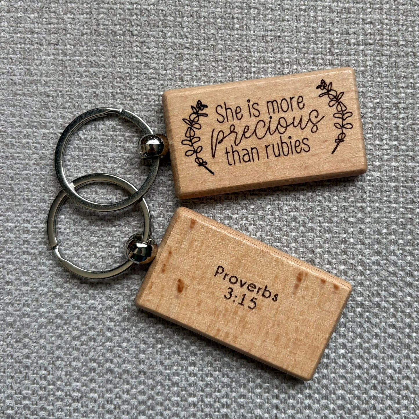 'She is more precious than rubies' wooden keyring