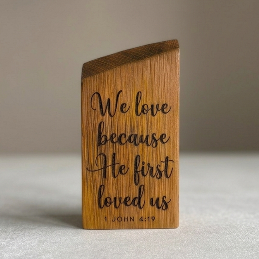 'We love because He first loved us' decorative white oak plaque